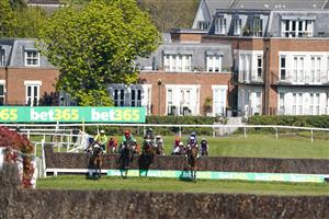 ESHER, ENGLAND - APRIL 24: A general view as runners clear the first during The bet365 Gold Cup Handicap Chase at Sandown Park Racecourse on April 24, 2021 in Esher, England. Sporting venues around the UK remain under restrictions due to the Coronavirus Pandemic. Only owners are allowed to attend the meeting but the public must wait until further restrictions are lifted. (Photo by Alan Crowhurst/Getty Images)