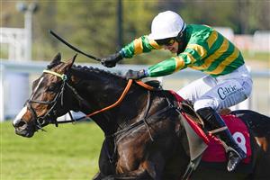 ESHER, ENGLAND - APRIL 24: Niall Houlihan riding Belargus (green) clear the last to win The bet365 Josh Gifford Novices' Handicap Chase at Sandown Park Racecourse on April 24, 2021 in Esher, England. Sporting venues around the UK remain under restrictions due to the Coronavirus Pandemic. Only owners are allowed to attend the meeting but the public must wait until further restrictions are lifted. (Photo by Alan Crowhurst/Getty Images)