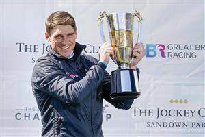 ESHER, ENGLAND - APRIL 24: Harry Skelton celebrates with his Champion Jockey trophy for the national hunt season 2020-21 at Sandown Park Racecourse on April 24, 2021 in Esher, England. Sporting venues around the UK remain under restrictions due to the Coronavirus Pandemic. Only owners are allowed to attend the meeting but the public must wait until further restrictions are lifted. (Photo by Alan Crowhurst/Getty Images)