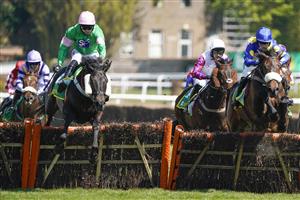 ESHER, ENGLAND - APRIL 24: Paddy Brennan riding Herbiers (green) clear the last to win The bet365 Novices' Championship Final Handicap Hurdle at Sandown Park Racecourse on April 24, 2021 in Esher, England. Sporting venues around the UK remain under restrictions due to the Coronavirus Pandemic. Only owners are allowed to attend the meeting but the public must wait until further restrictions are lifted. (Photo by Alan Crowhurst/Getty Images)