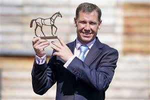ESHER, ENGLAND - APRIL 24: Richard Johnson with a trophy presented by Sandown Racecourse at Sandown Park Racecourse on April 24, 2021 in Esher, England. Sporting venues around the UK remain under restrictions due to the Coronavirus Pandemic. Only owners are allowed to attend the meeting but the public must wait until further restrictions are lifted. (Photo by Alan Crowhurst/Getty Images)