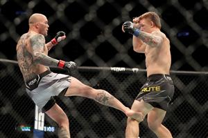 JACKSONVILLE, FL - APRIL 24: Anthony Smith of the United States kicks Jim Crute of Australia during UFC 261 at VyStar Veterans Memorial Arena on April 24, 2021 in Jacksonville, Florida. (Getty Images)