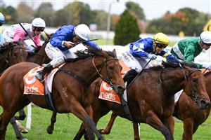 MELBOURNE, AUSTRALIA - APRIL 24: Laura Lafferty riding Intrepidacious winning Race 4, the L. U. Simon Builders Handicap, during Melbourne Racing at Caulfield Racecourse on April 24, 2021 in Melbourne, Australia. (Photo by Vince Caligiuri/Getty Images)