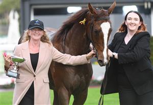 MELBOURNE, AUSTRALIA - APRIL 24: Monica Ryan (L) poses with Still A Star after winning Race 8, the Thoroughbred Club Anniversary Vase, during Melbourne Racing at Caulfield Racecourse on April 24, 2021 in Melbourne, Australia. (Photo by Vince Caligiuri/Getty Images)