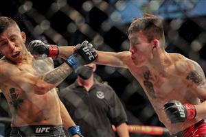 JACKSONVILLE, FL - APRIL 24: Aoriqileng of China punches Jeffrey Molina of the United States during UFC 261 at VyStar Veterans Memorial Arena on April 24, 2021 in Jacksonville, Florida. (Getty Images)