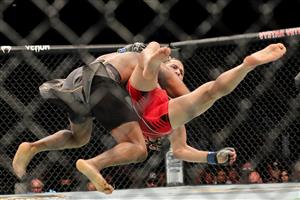 JACKSONVILLE, FL - APRIL 25: Kamaru Usman of Nigeria throws down Jorge Masvidal of the United States during the Welterweight Title bout of UFC 261 at VyStar Veterans Memorial Arena on April 25, 2021 in Jacksonville, Florida. (Getty Images)