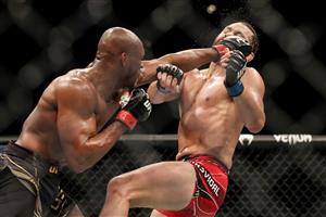 JACKSONVILLE, FL - APRIL 25: Kamaru Usman of Nigeria punches Jorge Masvidal of the United States during the Welterweight Title bout of UFC 261 at VyStar Veterans Memorial Arena on April 25, 2021 in Jacksonville, Florida. (Getty Images)