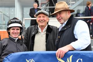 MELBOURNE, AUSTRALIA - APRIL 24: Trainer Peter Moody (R), breeder Rick Jamieson and Luke Nolen after the win of Gimmie Par in Race 1, the Wilde Racing Handicap, during Melbourne Racing at Caulfield Racecourse on April 24, 2021 in Melbourne, Australia. (Photo by Vince Caligiuri/Getty Images)