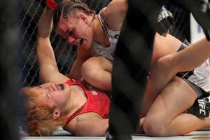 JACKSONVILLE, FL - APRIL 24: Ariane Carnelossi of Brazil punches Liang Na of China during UFC 261 early prelims at VyStar Veterans Memorial Arena on April 24, 2021 in Jacksonville, Florida. (Getty Images)