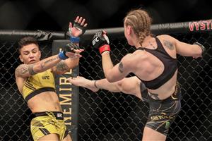 JACKSONVILLE, FL - APRIL 24: Valentina Shevchenko of Kyrgystan kicks Jessica Andrade of Brazil during the Womens Flyweight Title bout of UFC 261 at VyStar Veterans Memorial Arena on April 24, 2021 in Jacksonville, Florida. (Getty Images)