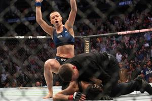 JACKSONVILLE, FL - APRIL 24: Rose Namajunas of the United States celebrates after beating Zhang Weili of China during the Women's Strawweight Title bout of UFC 261 at VyStar Veterans Memorial Arena on April 24, 2021 in Jacksonville, Florida. (Getty Images)