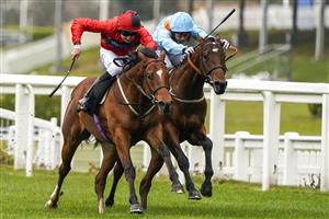 ASCOT, ENGLAND - APRIL 28: Charles Bishop riding Chipotle (red) win The Royal Ascot Two-Year-Old Trial Conditions Stakes at Ascot Racecourse on April 28, 2021 in Ascot, England. Sporting venues around the UK remain under restrictions due to the Coronavirus Pandemic. Only owners are allowed to attend the meeting but the public must wait until further restrictions are lifted. (Photo by Alan Crowhurst/Getty Images)