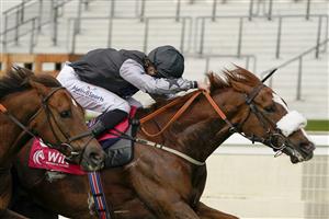 ASCOT, ENGLAND - APRIL 28: Angus Villiers riding Keyser Soze (black/grey) win The Women In Racing Manny Mercer Apprentice Handicap at Ascot Racecourse on April 28, 2021 in Ascot, England. Sporting venues around the UK remain under restrictions due to the Coronavirus Pandemic. Only owners are allowed to attend the meeting but the public must wait until further restrictions are lifted. (Photo by Alan Crowhurst/Getty Images)