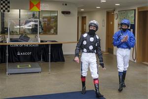ASCOT, ENGLAND - APRIL 28: Frankie Dettori (L) and William Buick leave the weighing room at Ascot Racecourse on April 28, 2021 in Ascot, England. Sporting venues around the UK remain under restrictions due to the Coronavirus Pandemic. Only owners are allowed to attend the meeting but the public must wait until further restrictions are lifted. (Photo by Alan Crowhurst/Getty Images)