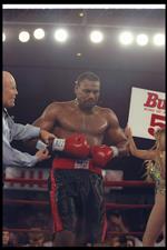 7 Feb 1997: Oliver McCall looks on during a bout against Lennox Lewis at the Las Vegas Hilton in Las Vegas, Nevada. Lewis won the fight. (Getty Images)