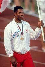 2 Oct 1988: Heavyweight boxer Lennox Lewis of Canada carries his National flag during the closing ceremony of the 1988 Olympic Games at the Olympic Stadium in Seoul, South Korea. Lewis won a gold medal in his Super Heavyweight bout against Riddick Boweof the USA. (Getty Images)