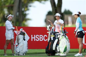 SINGAPORE, SINGAPORE - APRIL 29: (L to R) Nanna Koerstz Madsen of Denmark, Mel Reid of England and Xiyu Lin of China talk on the 1st tee during the first round of the HSBC Women's World Championship at Sentosa Golf Club on April 29, 2021 in Singapore. (Getty Images)