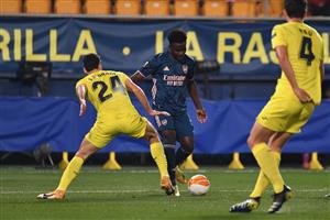 Villarreal's Spanish defender Alfonso Pedraza (L) challenges Arsenal's English striker Bukayo Saka during the Europa League semi-final first leg football match between Villarreal and Arsenal at the Ceramica stadium in Vila-real on April 29, 2021. (Getty Images)