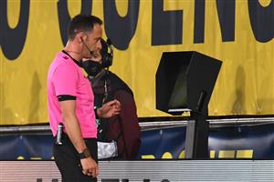 Portuguese referee Artur Manuel Ribeiro Soares Dias checks the VAR during the Europa League semi-final first leg football match between Villarreal and Arsenal at the Ceramica stadium in Vila-real on April 29, 2021. (Getty Images)