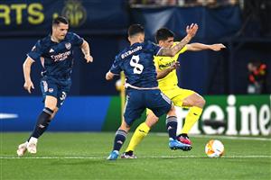 Arsenal's Spanish midfielder Dani Ceballos (C) challenges Villarreal's Spanish forward Gerard Moreno during the Europa League semi-final first leg football match between Villarreal and Arsenal at the Ceramica stadium in Vila-real on April 29, 2021. (Getty Images)
