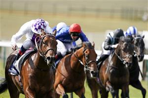 NEWMARKET, ENGLAND - MAY 01: Kevin Manning riding Poetic Flare (L, white) win The Qipco 2000 Guineas Stakes at Newmarket Racecourse on May 01, 2021 in Newmarket, England. Only owners are allowed to attend the meeting but the public must wait until further restrictions are lifted. (Photo by Alan Crowhurst/Getty Images)