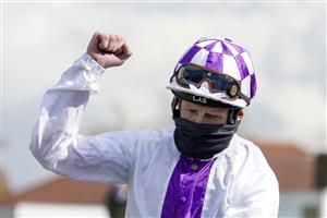 NEWMARKET, ENGLAND - MAY 01: Kevin Manning riding Poetic Flare celebrate after winning The Qipco 2000 Guineas Stakes at Newmarket Racecourse on May 01, 2021 in Newmarket, England. Only owners are allowed to attend the meeting but the public must wait until further restrictions are lifted. (Photo by Alan Crowhurst/Getty Images)