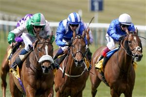 NEWMARKET, ENGLAND - MAY 01: William Carver riding Bell Rock (L, pink/green) win The 'My Oddsboost' On Betfair Suffolk Stakes at Newmarket Racecourse on May 01, 2021 in Newmarket, England. Only owners are allowed to attend the meeting but the public must wait until further restrictions are lifted. (Photo by Alan Crowhurst/Getty Images)