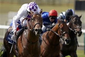 NEWMARKET, ENGLAND - MAY 01: Kevin Manning riding Poetic Flare (white) win The Qipco 2000 Guineas Stakes at Newmarket Racecourse on May 01, 2021 in Newmarket, England. Only owners are allowed to attend the meeting but the public must wait until further restrictions are lifted. (Photo by Alan Crowhurst/Getty Images)
