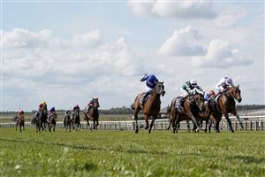 NEWMARKET, ENGLAND - MAY 01: Kevin Manning riding Poetic Flare (R, white) win The Qipco 2000 Guineas Stakes at Newmarket Racecourse on May 01, 2021 in Newmarket, England. Only owners are allowed to attend the meeting but the public must wait until further restrictions are lifted. (Photo by Alan Crowhurst/Getty Images)