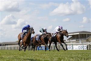 NEWMARKET, ENGLAND - MAY 01: Kevin Manning riding Poetic Flare (R, white) win The Qipco 2000 Guineas Stakes at Newmarket Racecourse on May 01, 2021 in Newmarket, England. Only owners are allowed to attend the meeting but the public must wait until further restrictions are lifted. (Photo by Alan Crowhurst/Getty Images)