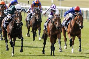 NEWMARKET, ENGLAND - MAY 01: Kevin Manning riding Poetic Flare (C, white) win The Qipco 2000 Guineas Stakes at Newmarket Racecourse on May 01, 2021 in Newmarket, England. Only owners are allowed to attend the meeting but the public must wait until further restrictions are lifted. (Photo by Alan Crowhurst/Getty Images)