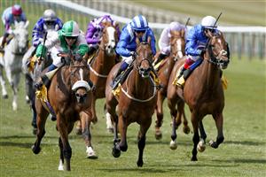 NEWMARKET, ENGLAND - MAY 01: William Carver riding Bell Rock (L, pink/green) win The 'My Oddsboost' On Betfair Suffolk Stakes at Newmarket Racecourse on May 01, 2021 in Newmarket, England. Only owners are allowed to attend the meeting but the public must wait until further restrictions are lifted. (Photo by Alan Crowhurst/Getty Images)