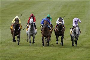 NEWMARKET, ENGLAND - MAY 01: William Buick riding Lazuli (blue) win The Betfair Palace House Stakes at Newmarket Racecourse on May 01, 2021 in Newmarket, England. Only owners are allowed to attend the meeting but the public must wait until further restrictions are lifted. (Photo by Alan Crowhurst/Getty Images)