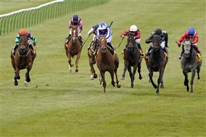 NEWMARKET, ENGLAND - MAY 02: Kieran Shoemark riding Lady Bowthorpe (L, orange cap) win The Betfair Dahlia Stakes at Newmarket Racecourse on May 02, 2021 in Newmarket, England. Only owners are allowed to attend the meeting but the public must wait until further restrictions are lifted. (Photo by Alan Crowhurst/Getty Images)