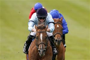 NEWMARKET, ENGLAND - MAY 02: Tom Marquand riding Parachute win The Betfair Weighed In Podcast Handicap at Newmarket Racecourse on May 02, 2021 in Newmarket, England. Only owners are allowed to attend the meeting but the public must wait until further restrictions are lifted. (Photo by Alan Crowhurst/Getty Images)