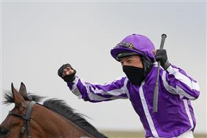 NEWMARKET, ENGLAND - MAY 02: Frankie Dettori celebrates after riding Mother Earth to win The Qipco 1000 Guineas Stakes at Newmarket Racecourse on May 02, 2021 in Newmarket, England. Only owners are allowed to attend the meeting but the public must wait until further restrictions are lifted. (Photo by Alan Crowhurst/Getty Images)