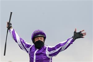 NEWMARKET, ENGLAND - MAY 02: Frankie Dettori celebrates after riding Mother Earth to win The Qipco 1000 Guineas Stakes at Newmarket Racecourse on May 02, 2021 in Newmarket, England. Only owners are allowed to attend the meeting but the public must wait until further restrictions are lifted. (Photo by Alan Crowhurst/Getty Images)