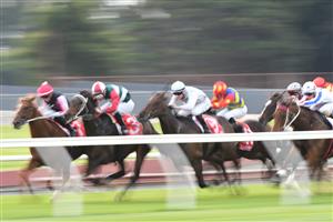 MELBOURNE, AUSTRALIA - MAY 01: Lachlan King riding Spring Choice winning Race 8, the Ladbrokes Easy Form Handicap, during Melbourne Racing at Sandown Hillside on May 01, 2021 in Melbourne, Australia. (Photo by Vince Caligiuri/Getty Images)