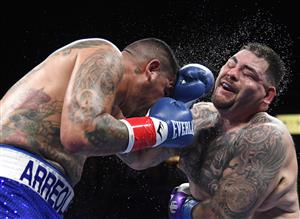 CARSON, CALIFORNIA - MAY 01: Andy Ruiz takes a punch from Chris Arreola, Ruiz would win in a 12 round unanimous decision, during a heavyweight bout at Dignity Health Sports Park on May 01, 2021 in Carson, California. (Getty Images)