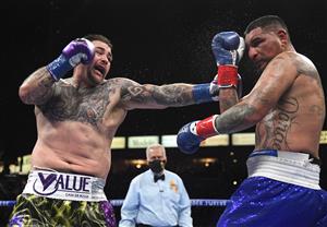 CARSON, CALIFORNIA - MAY 01: (L-R) Andy Ruiz punches Chris Arreola to a 12 round unanimous decision, during a heavyweight bout at Dignity Health Sports Park on May 01, 2021 in Carson, California. (Getty Images)