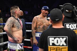 CARSON, CALIFORNIA - MAY 01: Chris Arreola complains about his loss in an interview in front of Andy Ruiz after losing in a unanimous decision during a heavyweight bout at Dignity Health Sports Park on May 01, 2021 in Carson, California. (Getty Images)