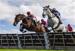 WARRNAMBOOL, AUSTRALIA - MAY 04: Steven Pateman riding Mawaany Machine (R) winning Race 3, the George Taylor Memorial Maiden Hurdle, on Brierly Day during the Warrnambool Jumps Carnival at Warrnambool Racing Club on May 04, 2021 in Warrnambool, Australia. (Photo by Vince Caligiuri/Getty Images)