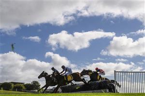 WARRNAMBOOL, AUSTRALIA - MAY 04: Darryl Horner jnr riding Flying Agent defeats Steven Pateman riding Bit of a Lad in Race 6, the 3yb Scotty Stewart Brierly Steeplechase, on Brierly Day during the Warrnambool Jumps Carnival at Warrnambool Racing Club on May 04, 2021 in Warrnambool, Australia. (Photo by Vince Caligiuri/Getty Images)