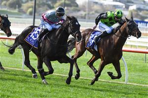 WARRNAMBOOL, AUSTRALIA - MAY 04: Will Price riding Patch Adams winning race 8, the Magic Millions National Sale Handicap, on Brierly Day during the Warrnambool Jumps Carnival at Warrnambool Racing Club on May 04, 2021 in Warrnambool, Australia. (Photo by Vince Caligiuri/Getty Images)