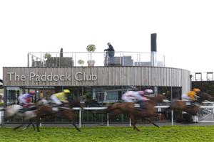 CHESTER, ENGLAND - MAY 06: A general view as runners pass the Paddock Bar during The Boodles Handicap at Chester Racecourse on May 06, 2021 in Chester, England. Only owners are allowed to attend the meeting but the public must wait until further restrictions are lifted. (Photo by Alan Crowhurst/Getty Images)