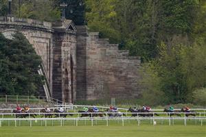 CHESTER, ENGLAND - MAY 06: A general view as runners begin the turn onto the straight during The Destination 2 Handicap at Chester Racecourse on May 06, 2021 in Chester, England. Only owners are allowed to attend the meeting but the public must wait until further restrictions are lifted. (Photo by Alan Crowhurst/Getty Images)