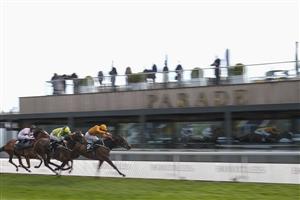 CHESTER, ENGLAND - MAY 06: Franny Norton riding Love Is Golden (orange) win The Boodles Handicap at Chester Racecourse on May 06, 2021 in Chester, England. Only owners are allowed to attend the meeting but the public must wait until further restrictions are lifted. (Photo by Alan Crowhurst/Getty Images)