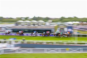 CHESTER, ENGLAND - MAY 06: A general view as runners pass the enclosures during The Destination 2 Handicap at Chester Racecourse on May 06, 2021 in Chester, England. Only owners are allowed to attend the meeting but the public must wait until further restrictions are lifted. (Photo by Alan Crowhurst/Getty Images)