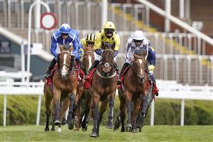 CHESTER, ENGLAND - MAY 06: Ryan Moore riding Japan (R, white cap) on their way to winning The tote+ Pays You More At tote.co.uk Ormonde Stakes at Chester Racecourse on May 06, 2021 in Chester, England. Only owners are allowed to attend the meeting but the public must wait until further restrictions are lifted. (Photo by Alan Crowhurst/Getty Images)