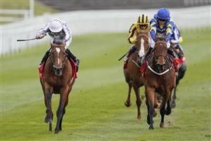 CHESTER, ENGLAND - MAY 06: Ryan Moore riding Japan (L) win The tote+ Pays You More At tote.co.uk Ormonde Stakes at Chester Racecourse on May 06, 2021 in Chester, England. Only owners are allowed to attend the meeting but the public must wait until further restrictions are lifted. (Photo by Alan Crowhurst/Getty Images)
